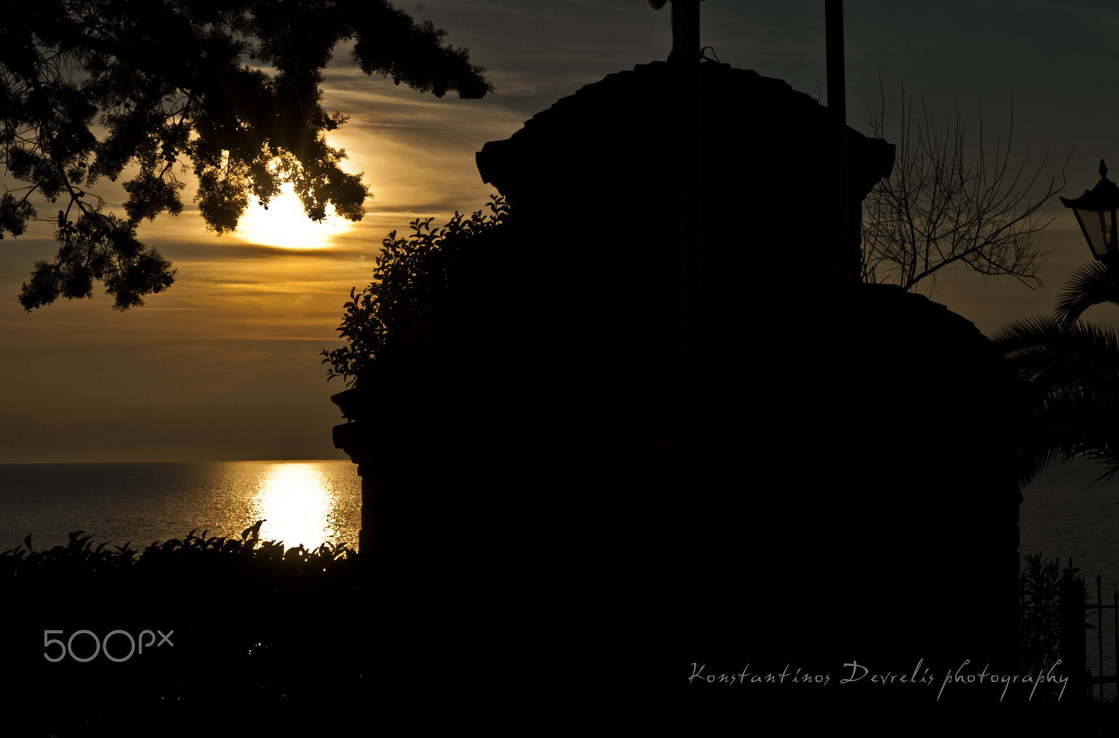 Nikon AF-S Nikkor 28-70mm F2.8 ED-IF sample photo. A peacefull sunset in greece near a small chapel . photography