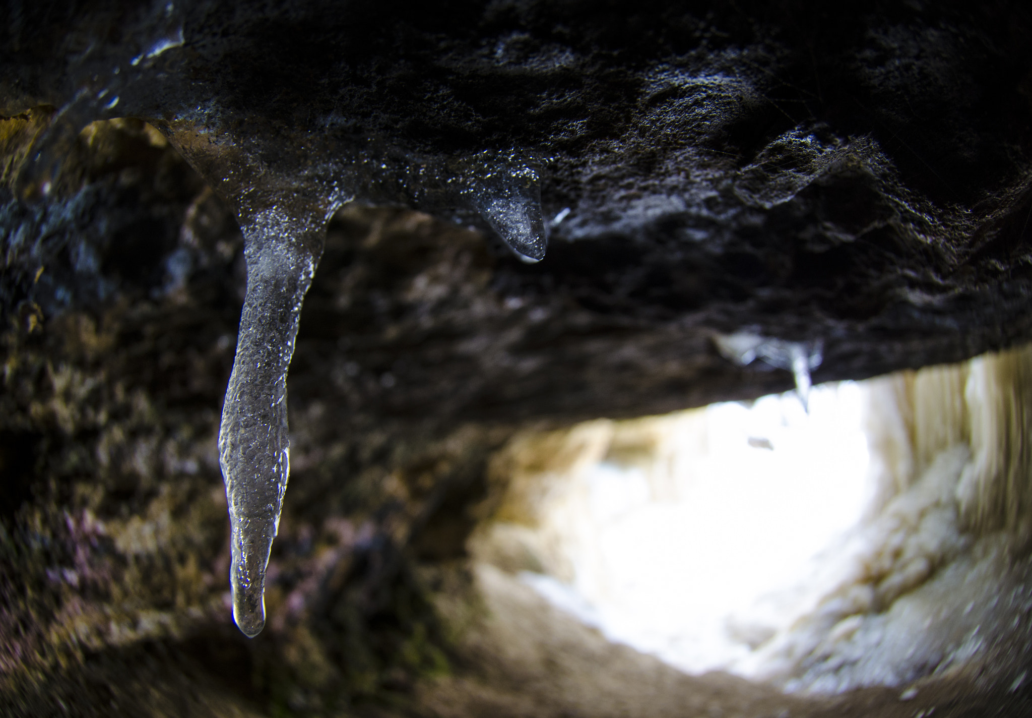 Nikon AF DX Fisheye-Nikkor 10.5mm F2.8G ED sample photo. Behind the falls photography