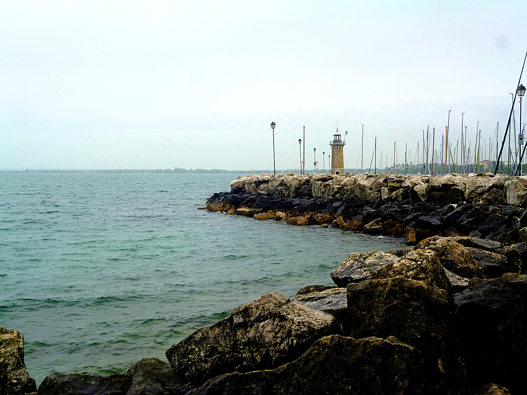 Panasonic DMC-FS16 sample photo. Lighthouse on lake garda photography