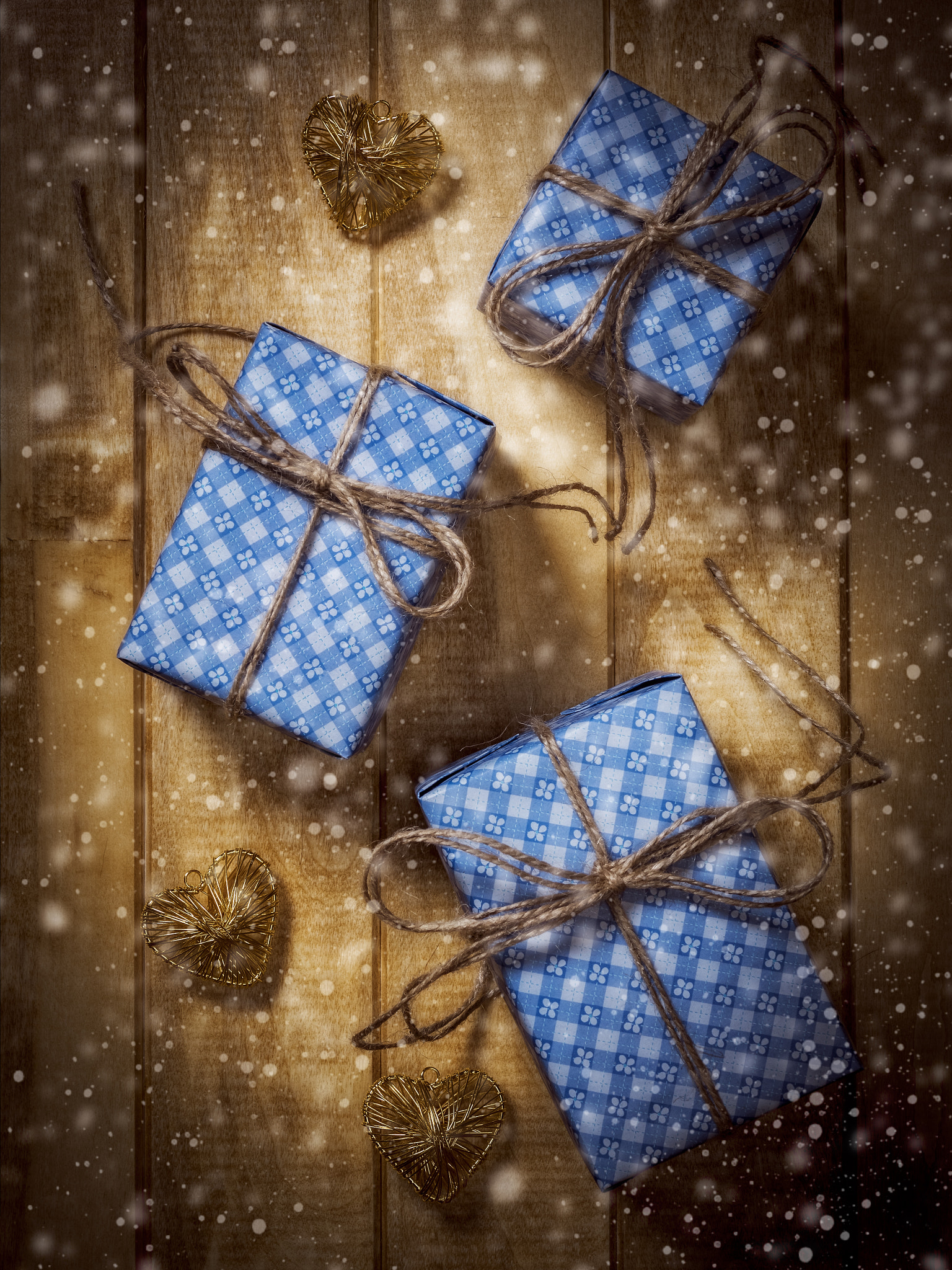 Olympus OM-D E-M1 + OLYMPUS 50mm Lens sample photo. Gift boxes in blue paper on the wooden table photography