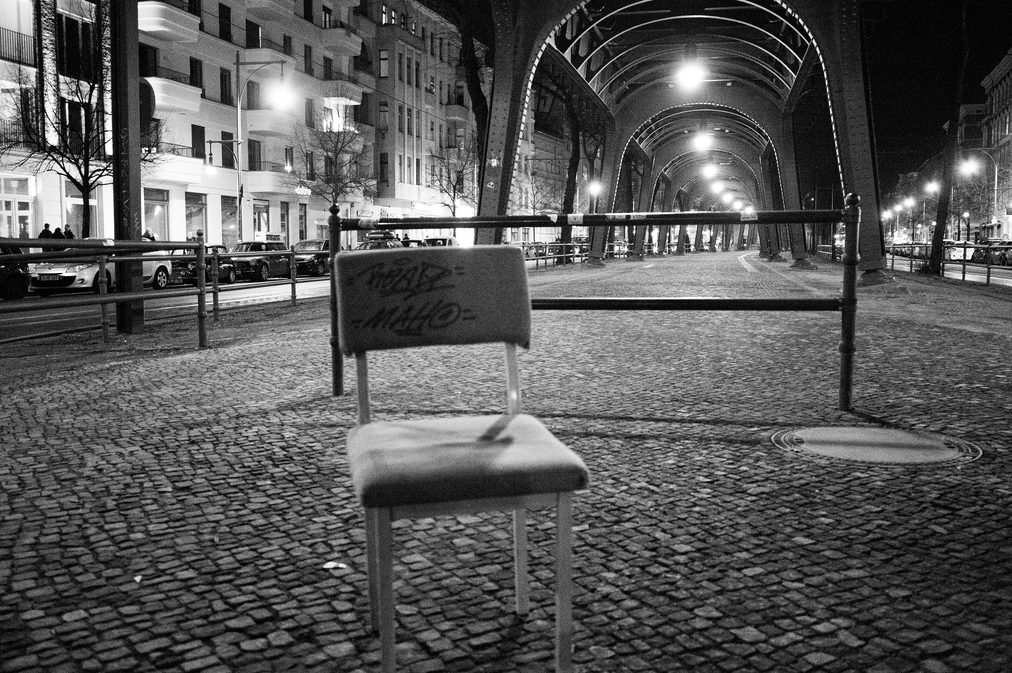 Nikon AF-S Nikkor 18-35mm F3.5-4.5G ED sample photo. Chair under the u bahn photography