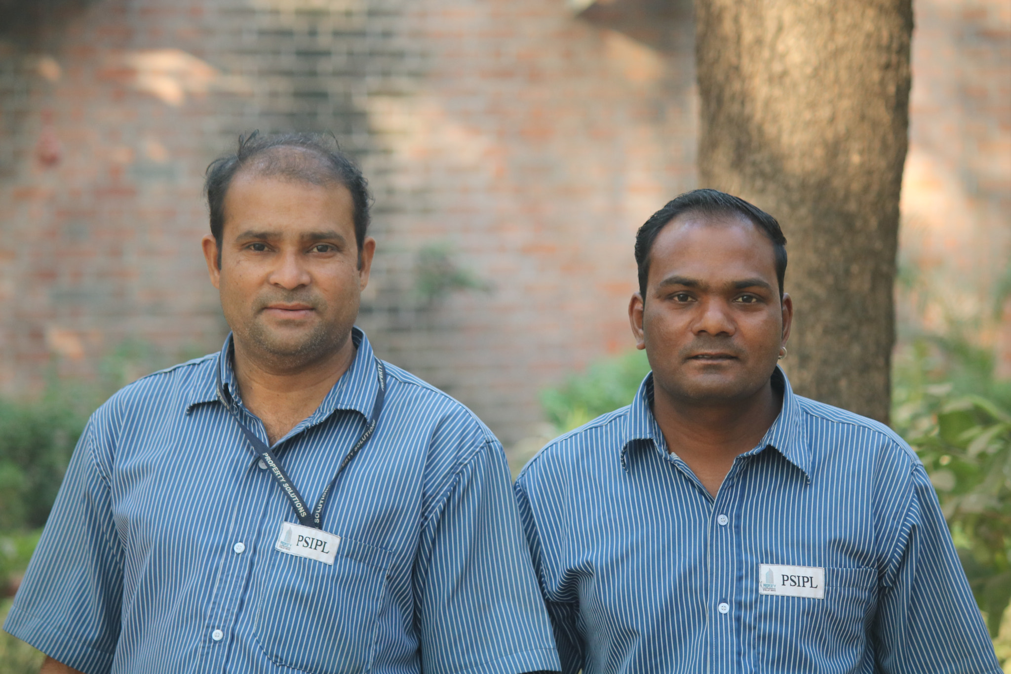 Canon EF-S 55-250mm F4-5.6 IS sample photo. Portrait  of workers photography