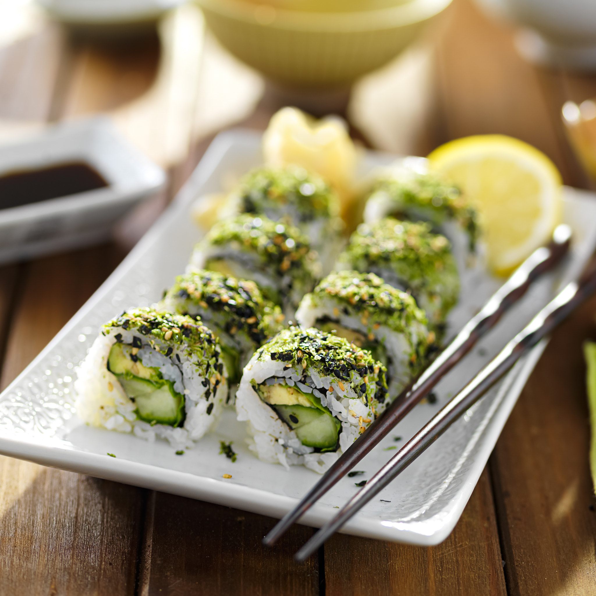 HC 120 sample photo. Green themed veggie sushi roll on plate with avocado, kale and cucumber photography