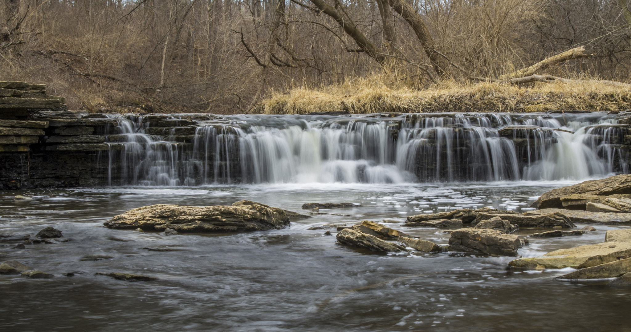 Canon EOS 1200D (EOS Rebel T5 / EOS Kiss X70 / EOS Hi) sample photo. Rocky waterfall glen photography