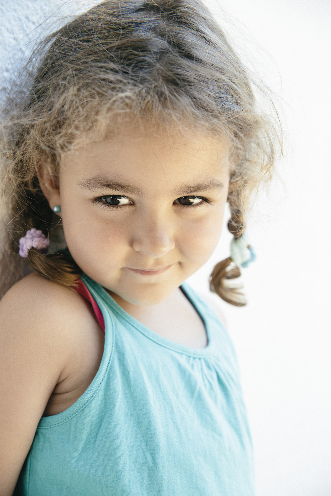 Sigma 24-70mm F2.8 EX DG Macro sample photo. Close-up of cute little girl with two braids photography