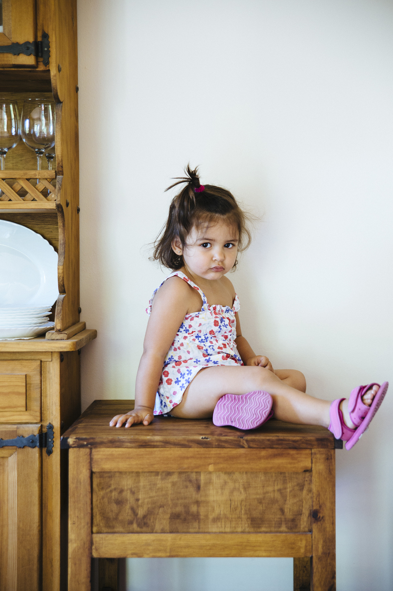 Sigma 24-70mm F2.8 EX DG Macro sample photo. Cute little girl with tail sitting on wooden table photography