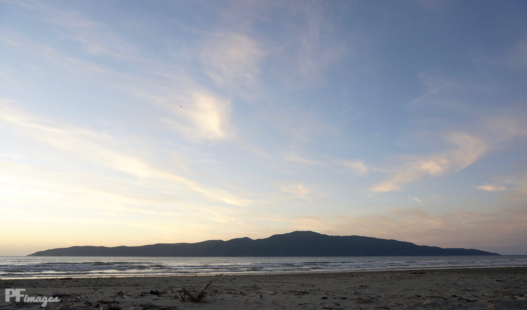Sony Alpha NEX-5R + Sony E 18-50mm F4-5.6 sample photo. Kapiti from paraparaumu beach photography