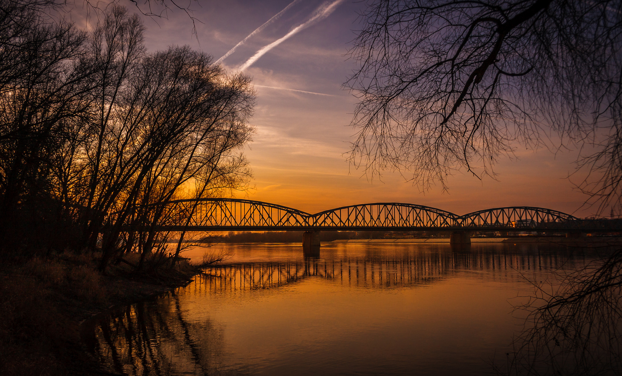 Canon EF-S 18-55mm F3.5-5.6 sample photo. Sunset behind the bridge photography
