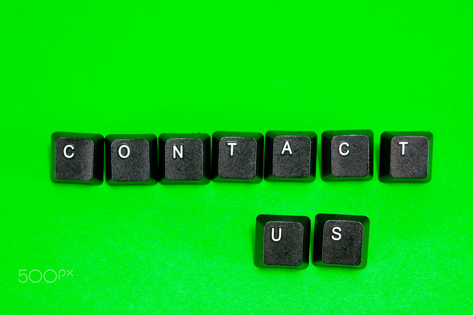 Canon EF 28-90mm f/4-5.6 sample photo. Keyboard plastic keys with words contact us photography