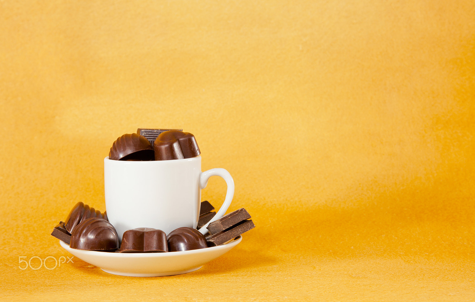 Canon EF 28-90mm f/4-5.6 sample photo. Cup full with chocolate candies photography