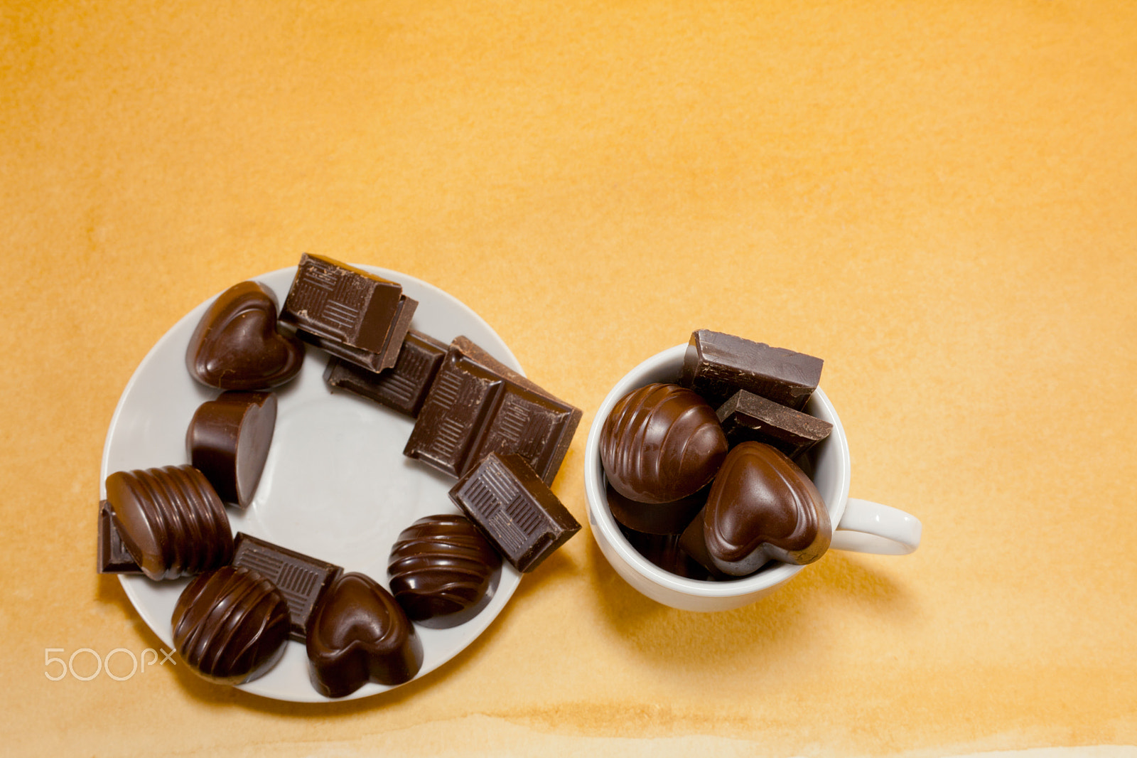 Canon EOS 5D Mark II + Canon EF 28-90mm f/4-5.6 sample photo. Cup full with chocolate candies photography