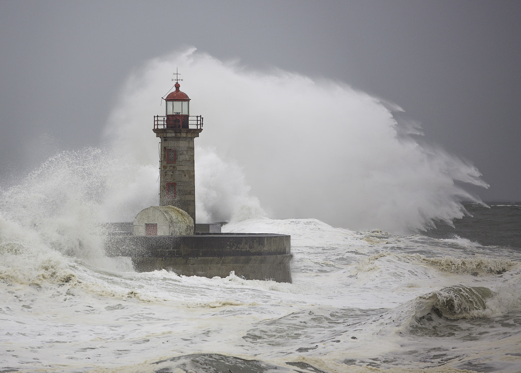 lighthouse in storm by Nuno Sousa Cerqueira / 500px