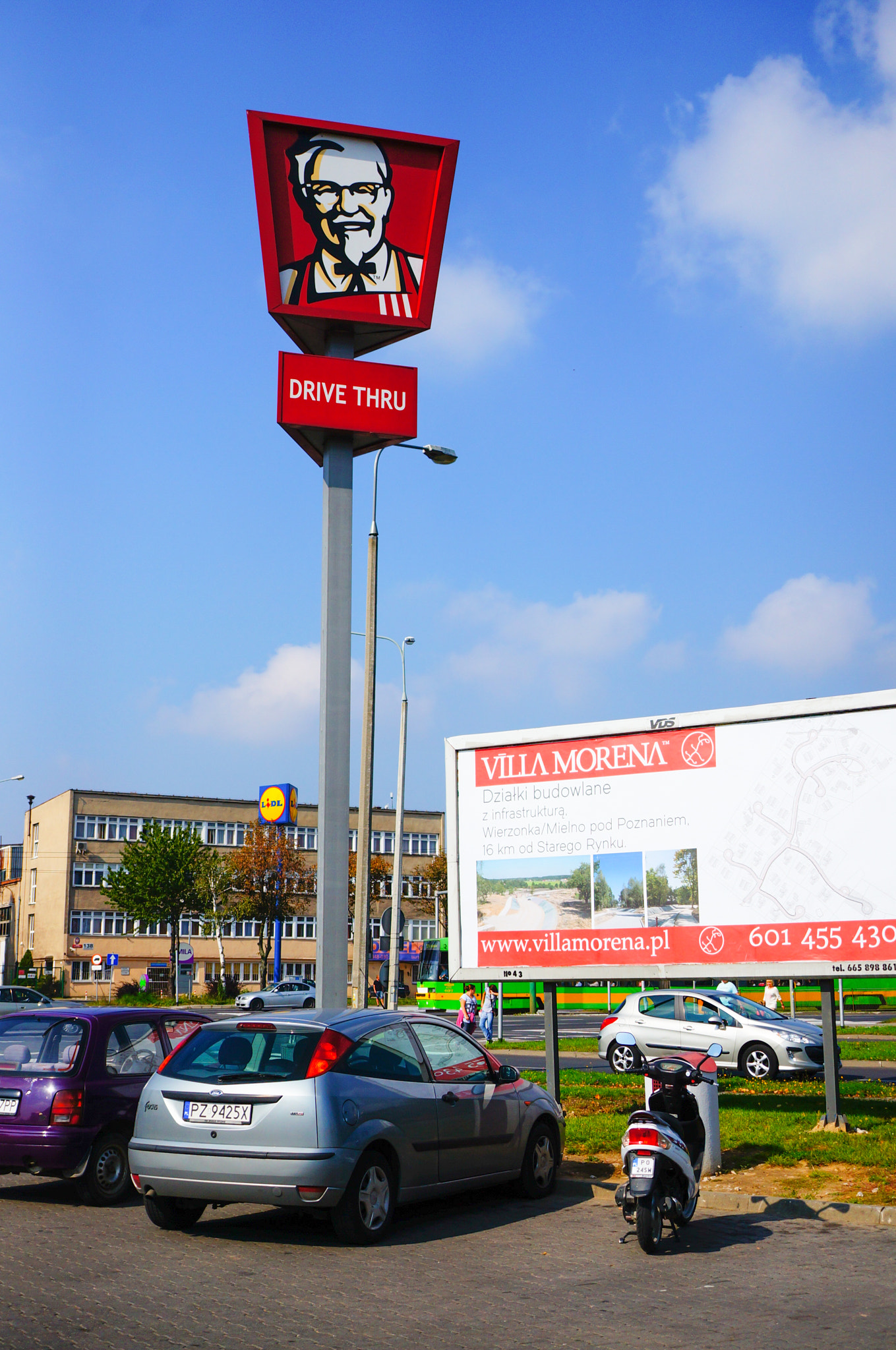 Sony Alpha NEX-5N + Sony E 30mm F3.5 Macro sample photo. Advertisement boards photography