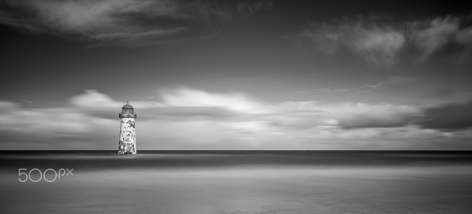 Canon EOS M + Sigma 10-20mm F4-5.6 EX DC HSM sample photo. Lighthouse in the sea photography