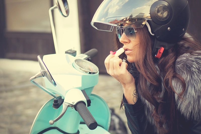 Olympus OM-D E-M1 + OLYMPUS 50mm Lens sample photo. Young beautiful italian woman sitting on vespa photography