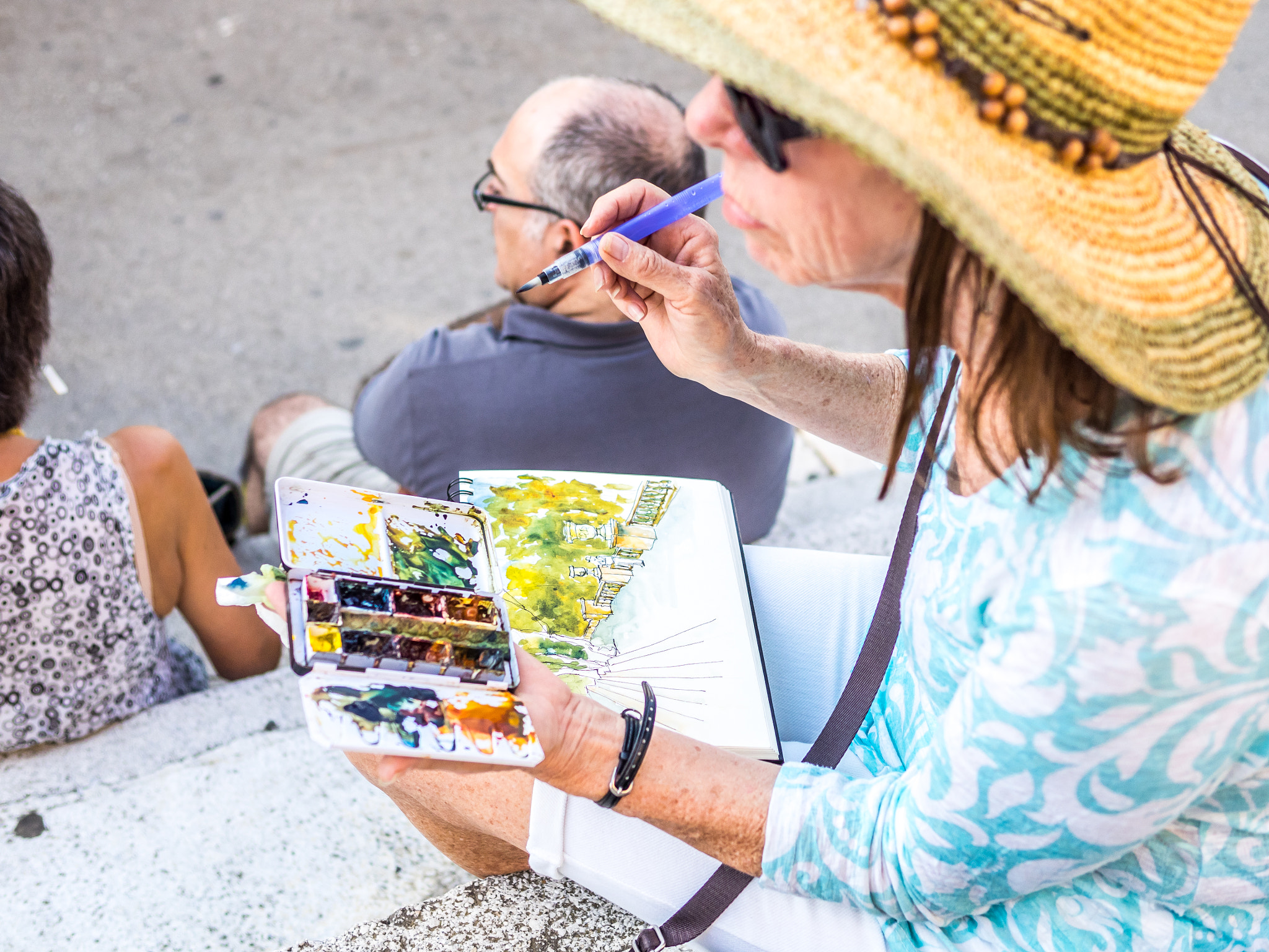 Olympus OM-D E-M1 + Panasonic Leica DG Summilux 25mm F1.4 II ASPH sample photo. The street painter photography