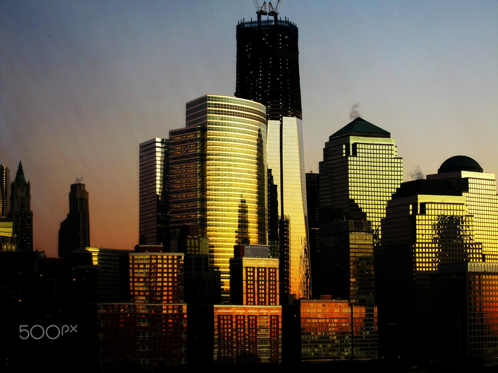 Canon PowerShot SD960 IS (Digital IXUS 110 IS / IXY Digital 510 IS) sample photo. Sunset on buildings photography