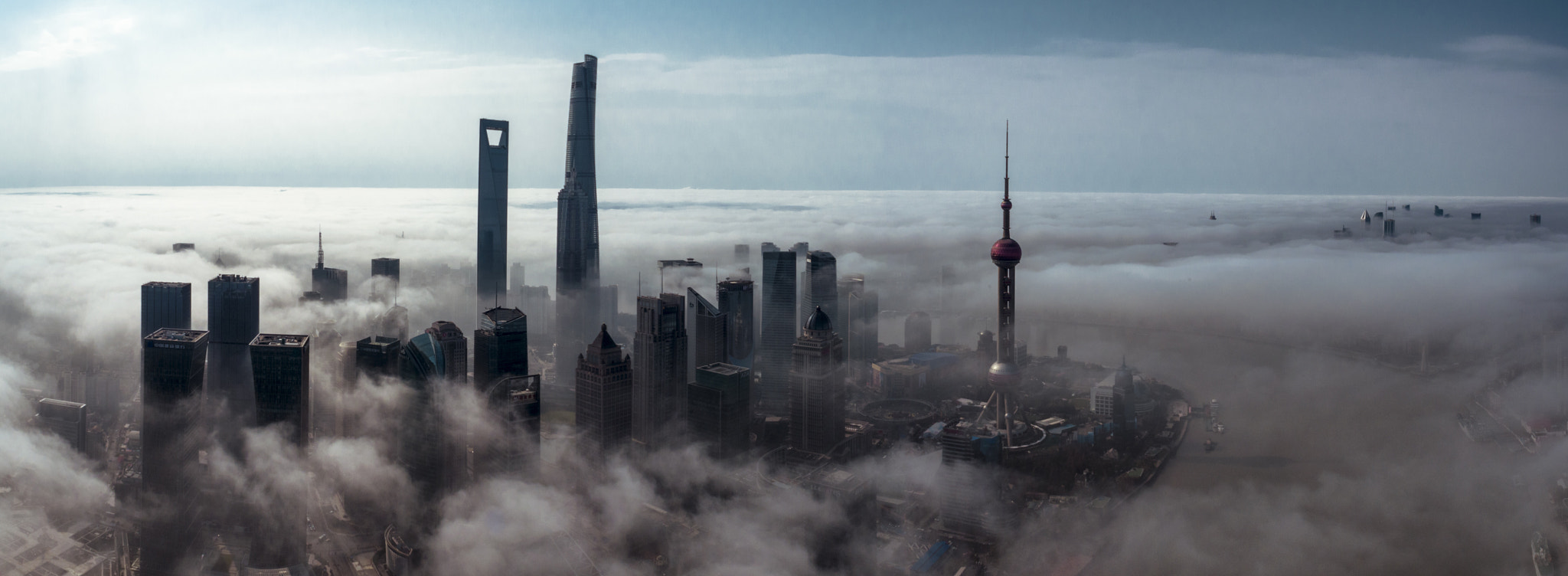 DJI FC550 sample photo. A glance of the magnificent city of shanghai from above through clouds photography