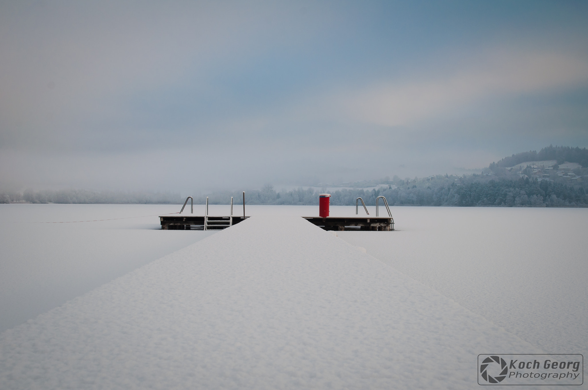 Sigma 18-50mm F2.8-4.5 DC OS HSM sample photo. Lake covered by snow photography