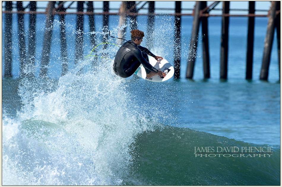 Nikon D7000 + Nikon AF-S Nikkor 500mm F4G ED VR sample photo. Surf's up:  catching air photography