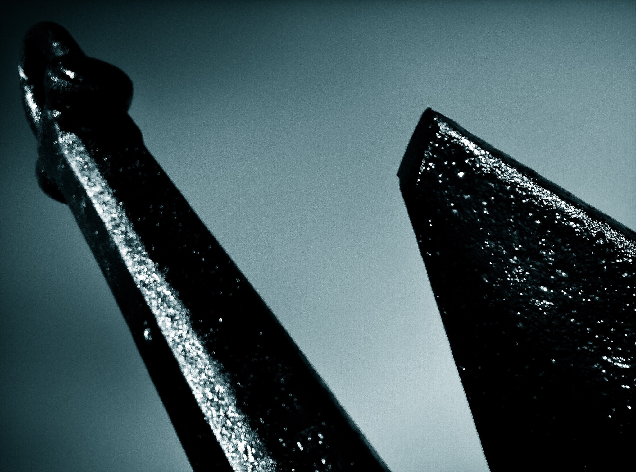 Hipstamatic 304 sample photo. Detail of an old ship's anchor against a sky backdrop. photography