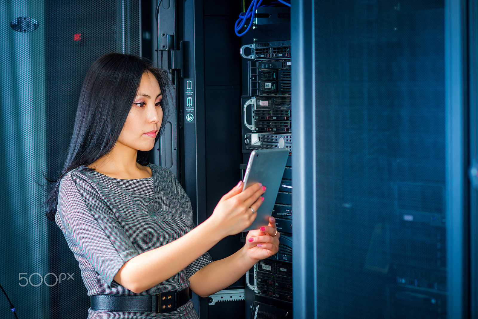 Nikon D600 + AF DC-Nikkor 135mm f/2 sample photo. Engineer businesswoman in network server room photography