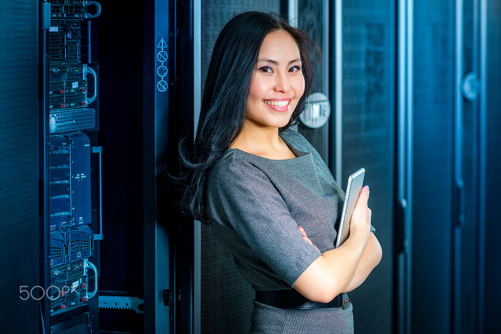 Nikon D600 + AF DC-Nikkor 135mm f/2 sample photo. Engineer businesswoman in network server room photography