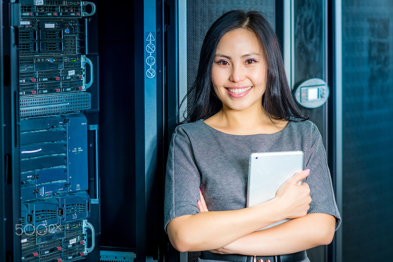 Nikon D600 + AF DC-Nikkor 135mm f/2 sample photo. Engineer businesswoman in network server room photography