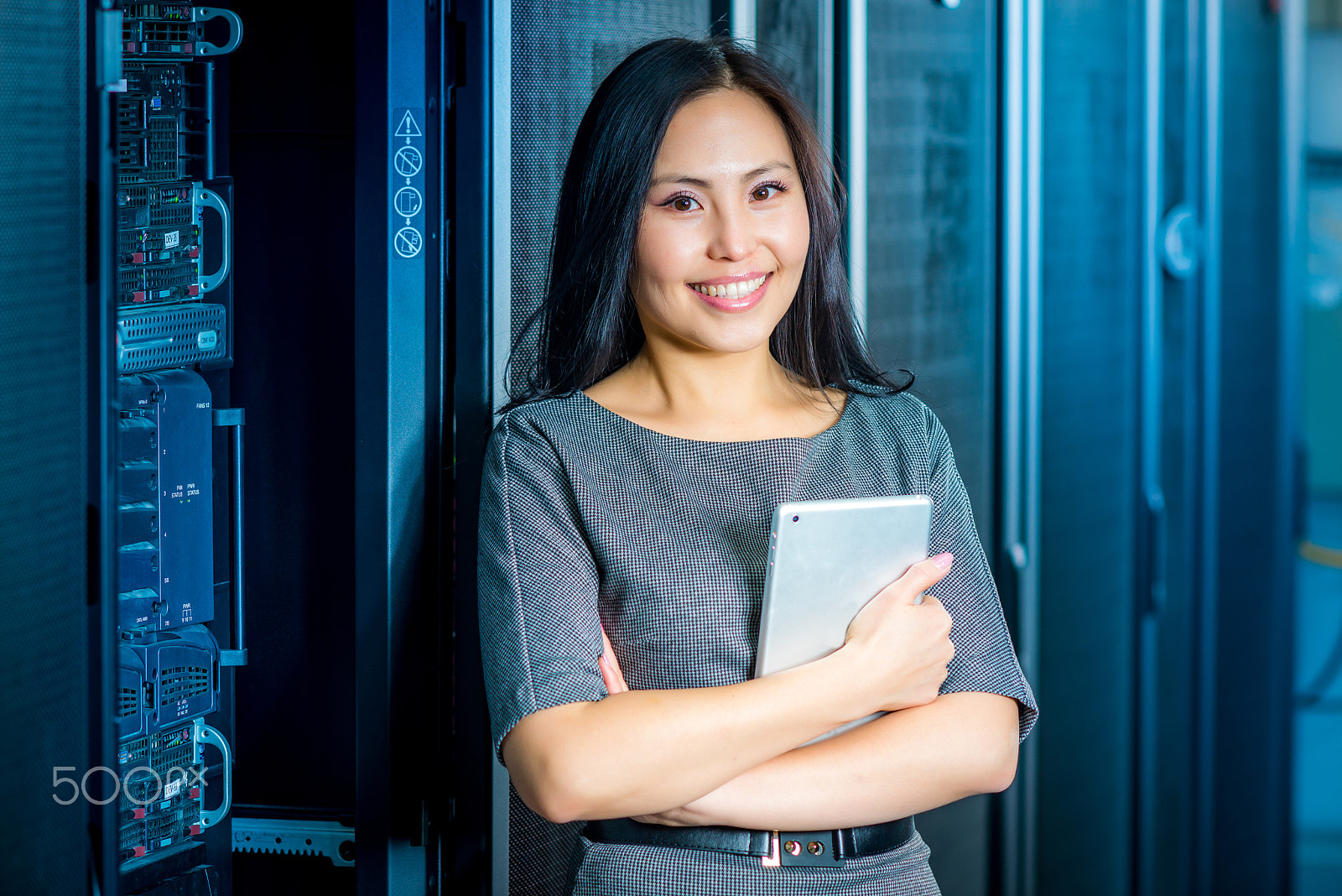 Nikon D600 + AF DC-Nikkor 135mm f/2 sample photo. Engineer businesswoman in network server room photography