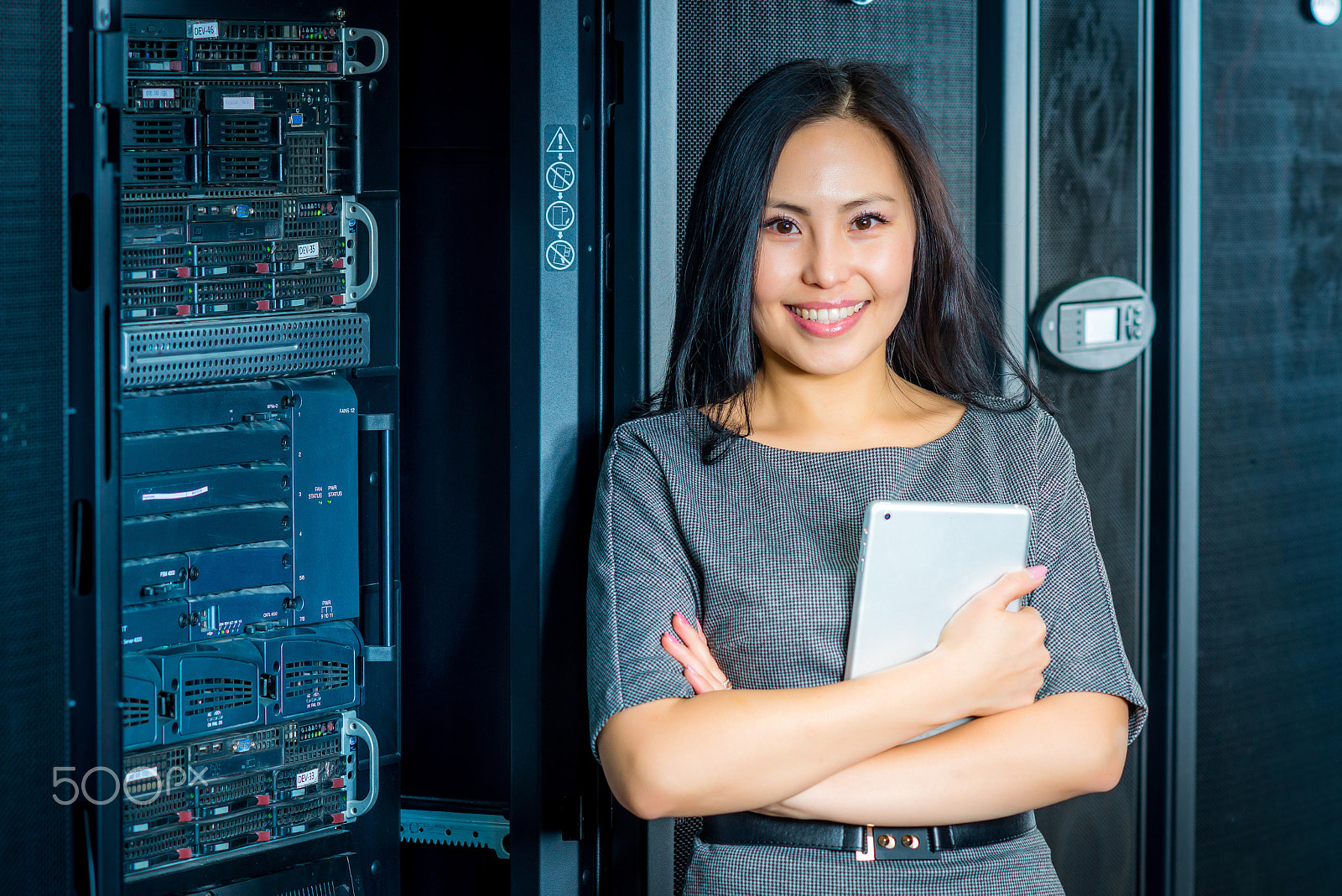 Nikon D600 + AF DC-Nikkor 135mm f/2 sample photo. Engineer businesswoman in network server room photography