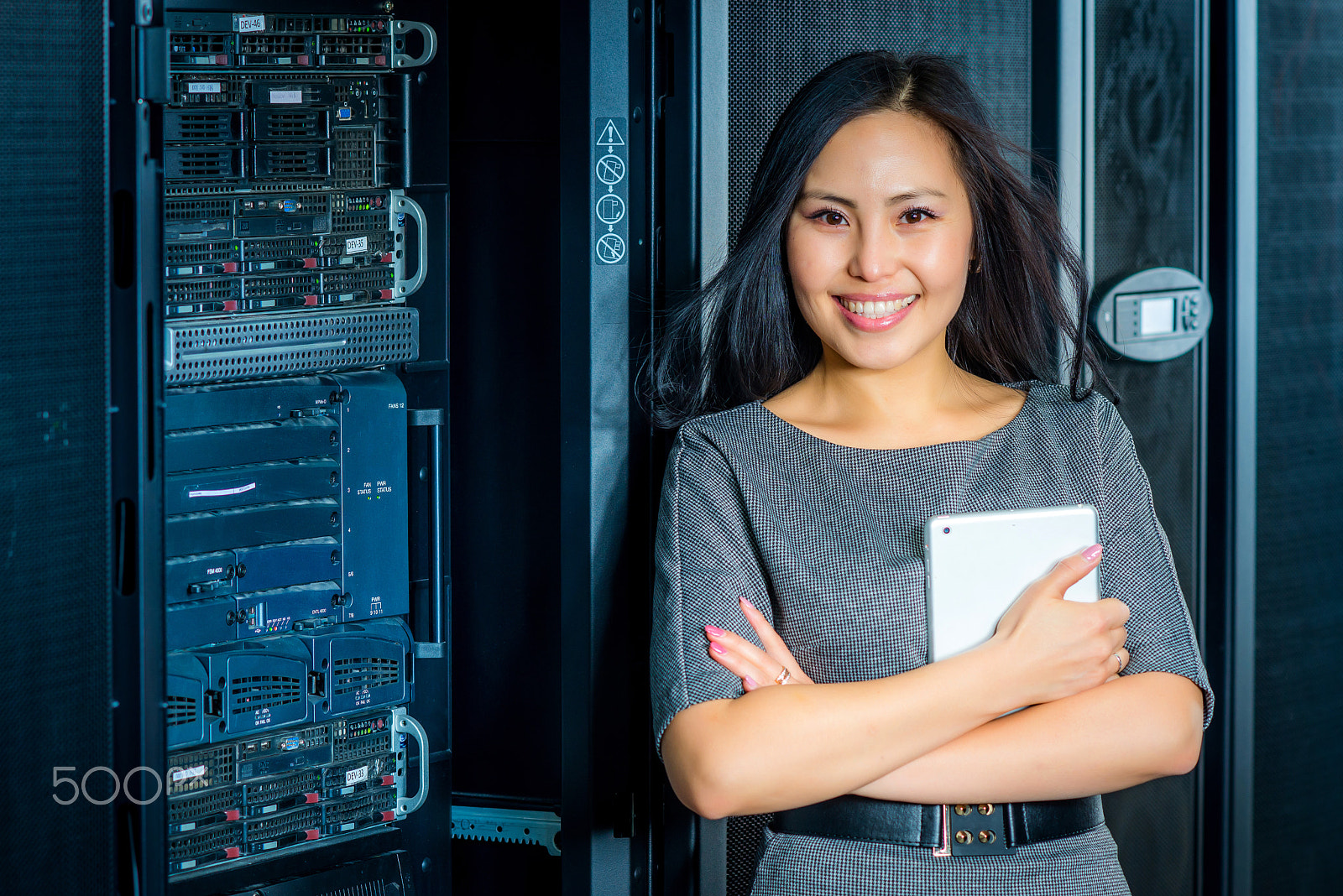 Nikon D600 + AF DC-Nikkor 135mm f/2 sample photo. Engineer businesswoman in network server room photography