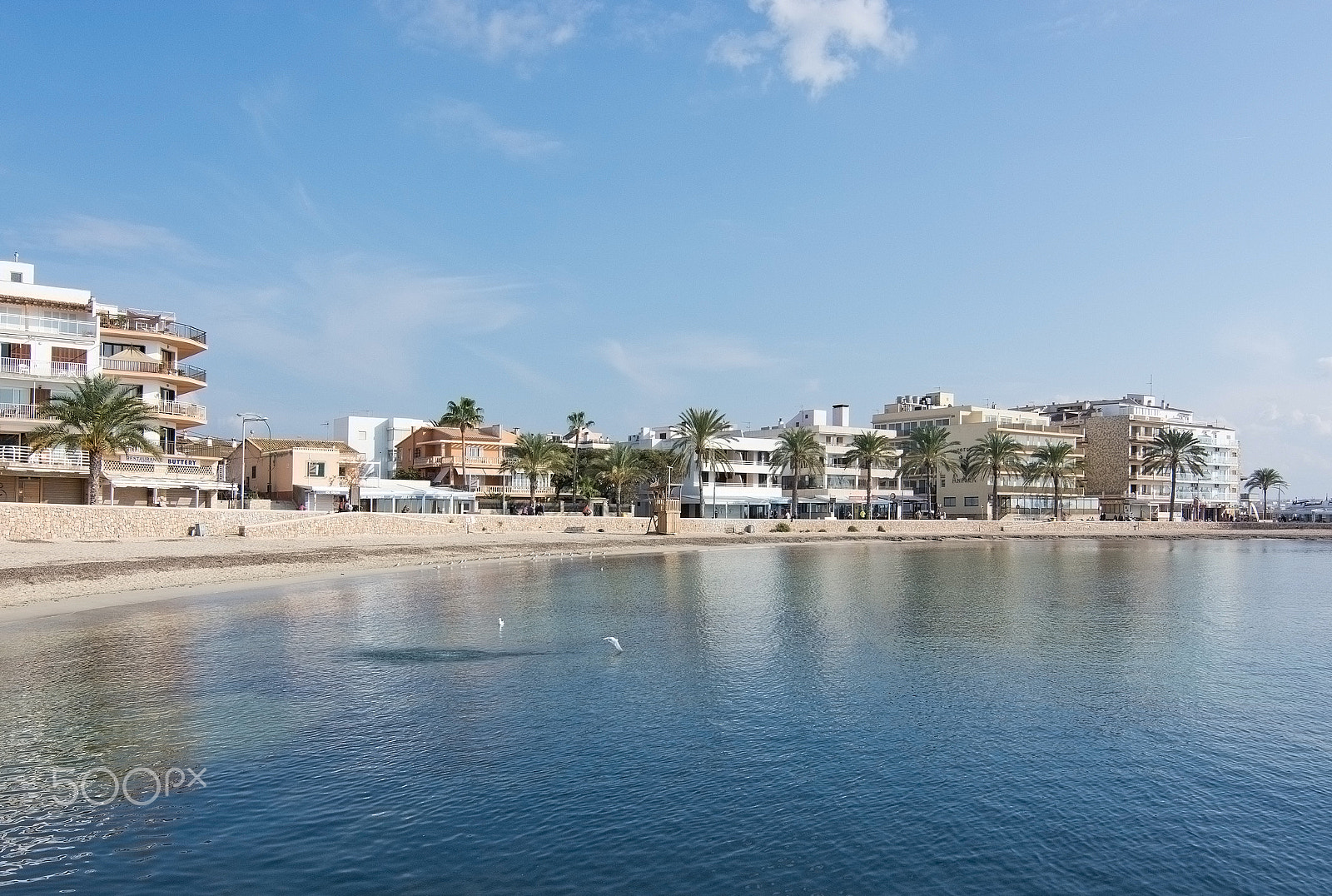 Nikon D7100 + AF Nikkor 70-210mm f/4-5.6D sample photo. Tranquil winter bay and hotels photography