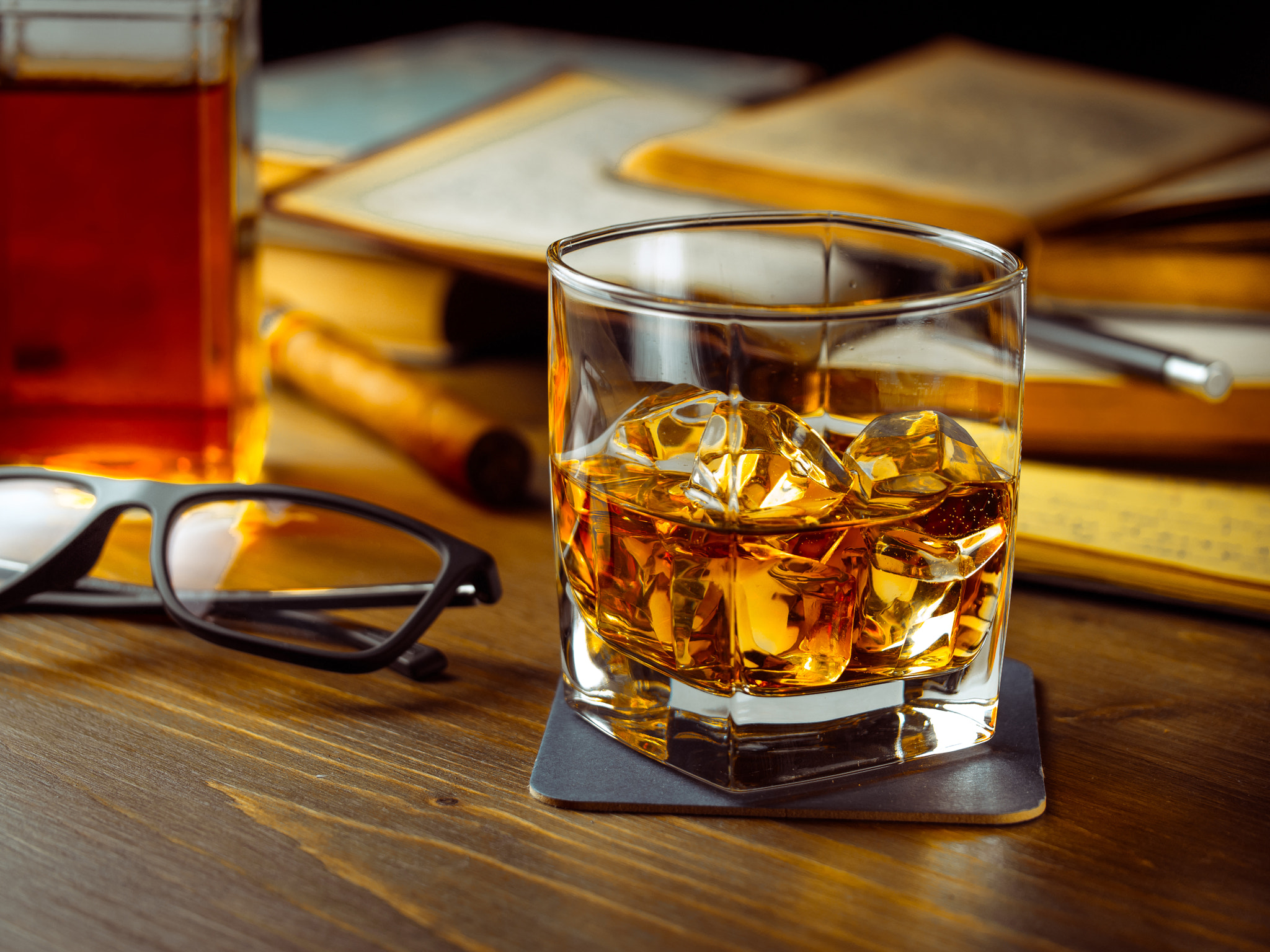 Panasonic Leica DG Macro-Elmarit 45mm F2.8 ASPH OIS sample photo. Whiskey on the rocks and scholar books photography