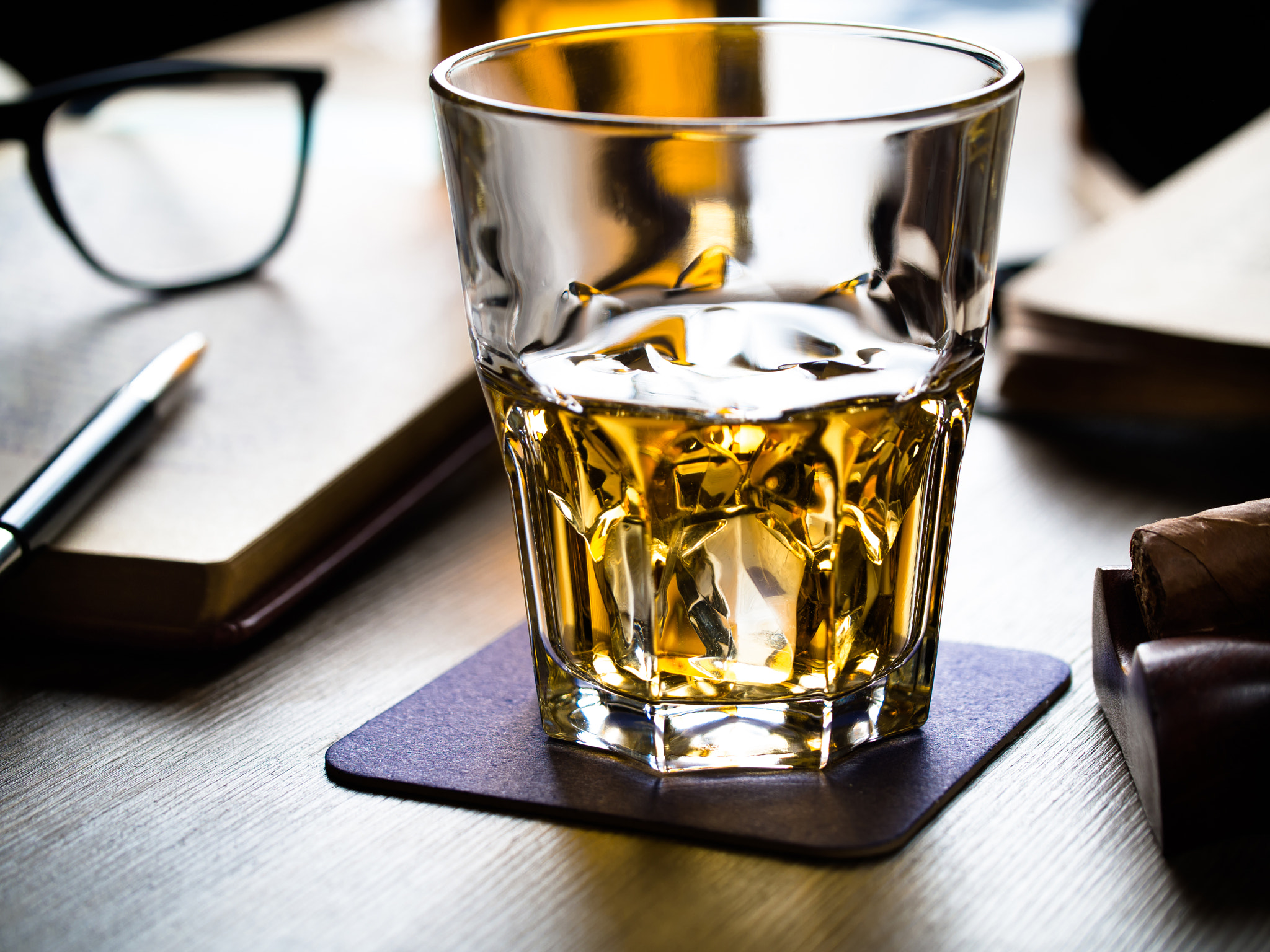 Panasonic Leica DG Macro-Elmarit 45mm F2.8 ASPH OIS sample photo. Whiskey on the rocks and scholar books photography