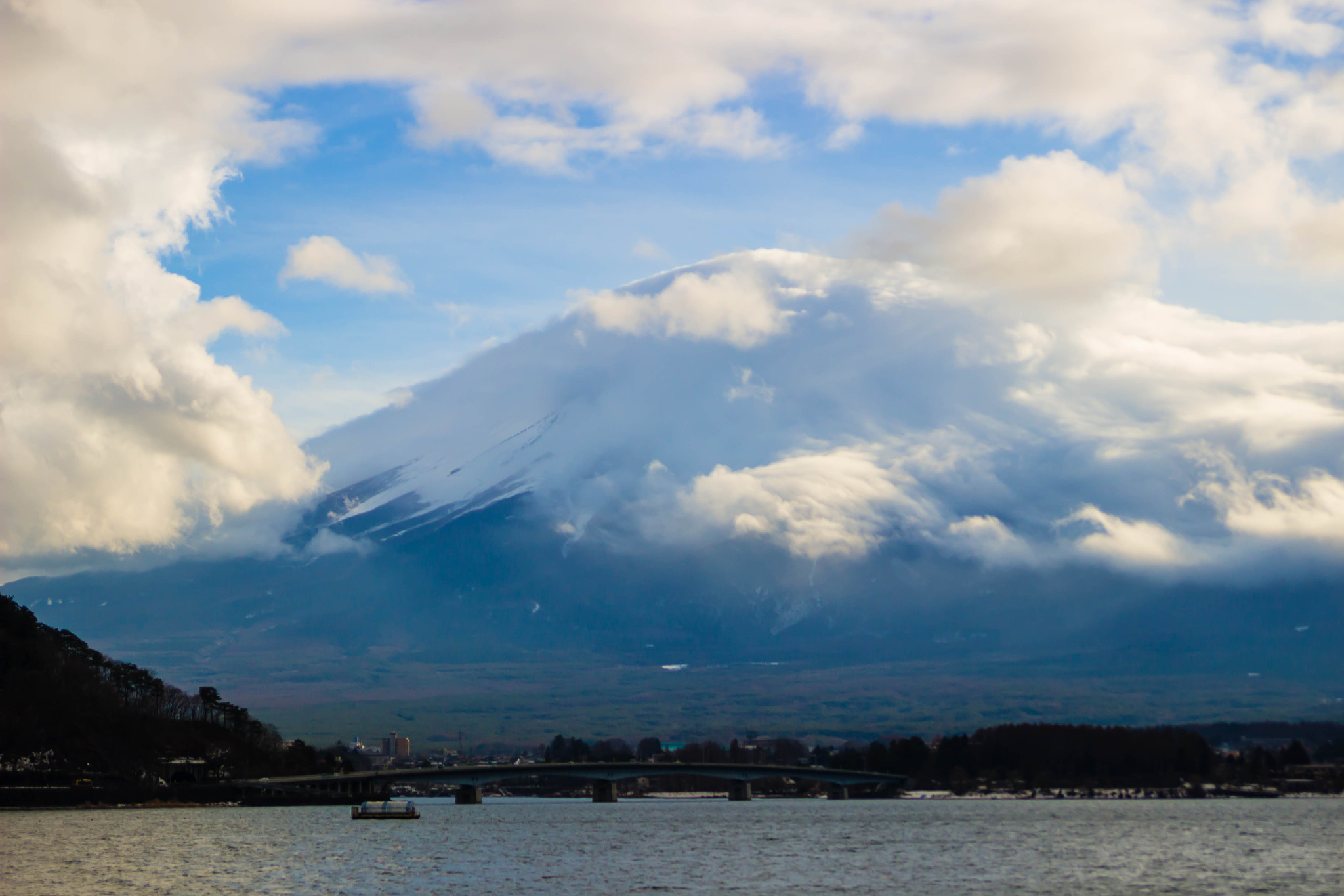 Canon EOS 100D (EOS Rebel SL1 / EOS Kiss X7) sample photo. Glimpsing mount fuji through the clouds. photography
