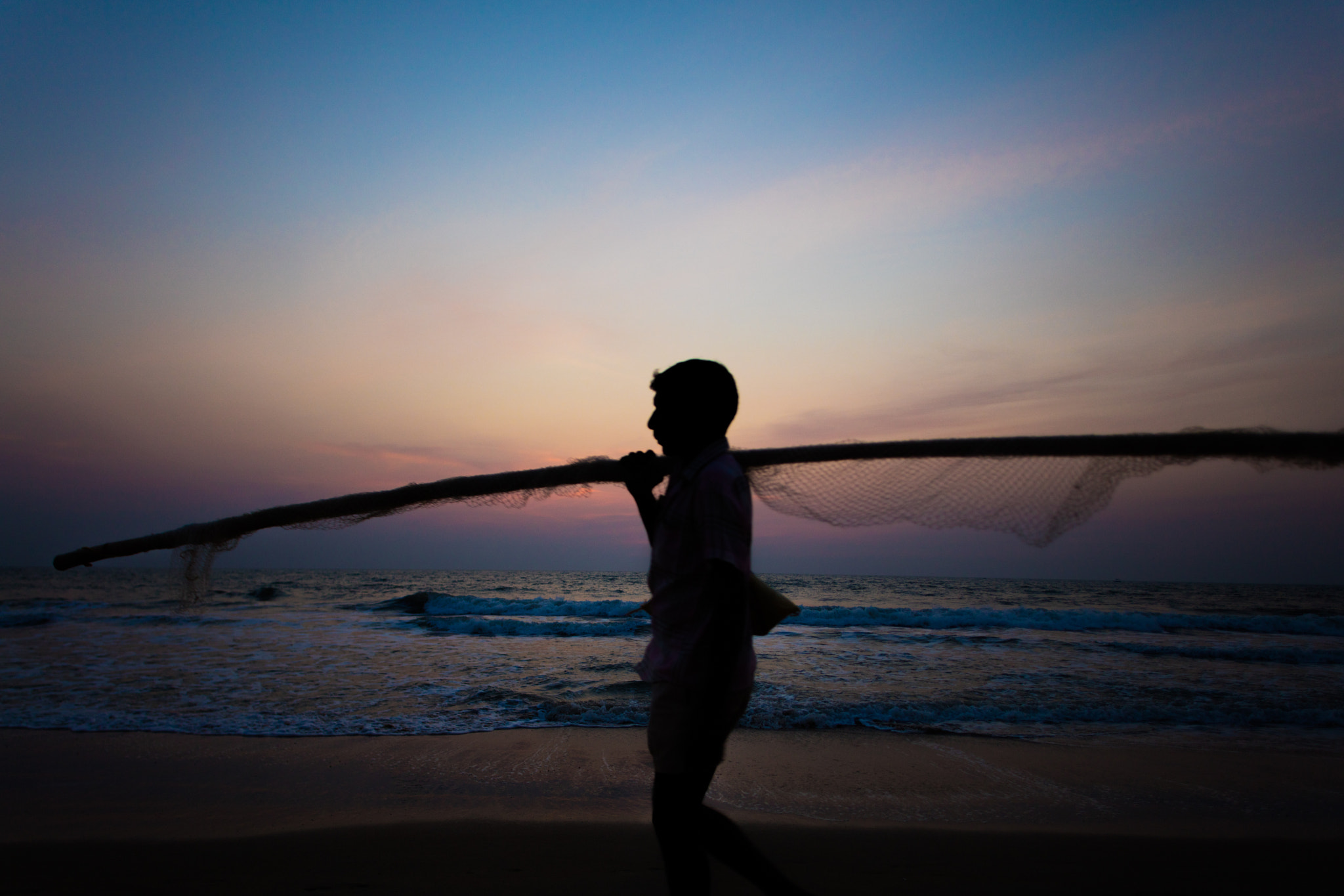 Canon EOS 5DS + Canon TS-E 24mm f/3.5L sample photo. Fisherman walking back home at dawn. photography