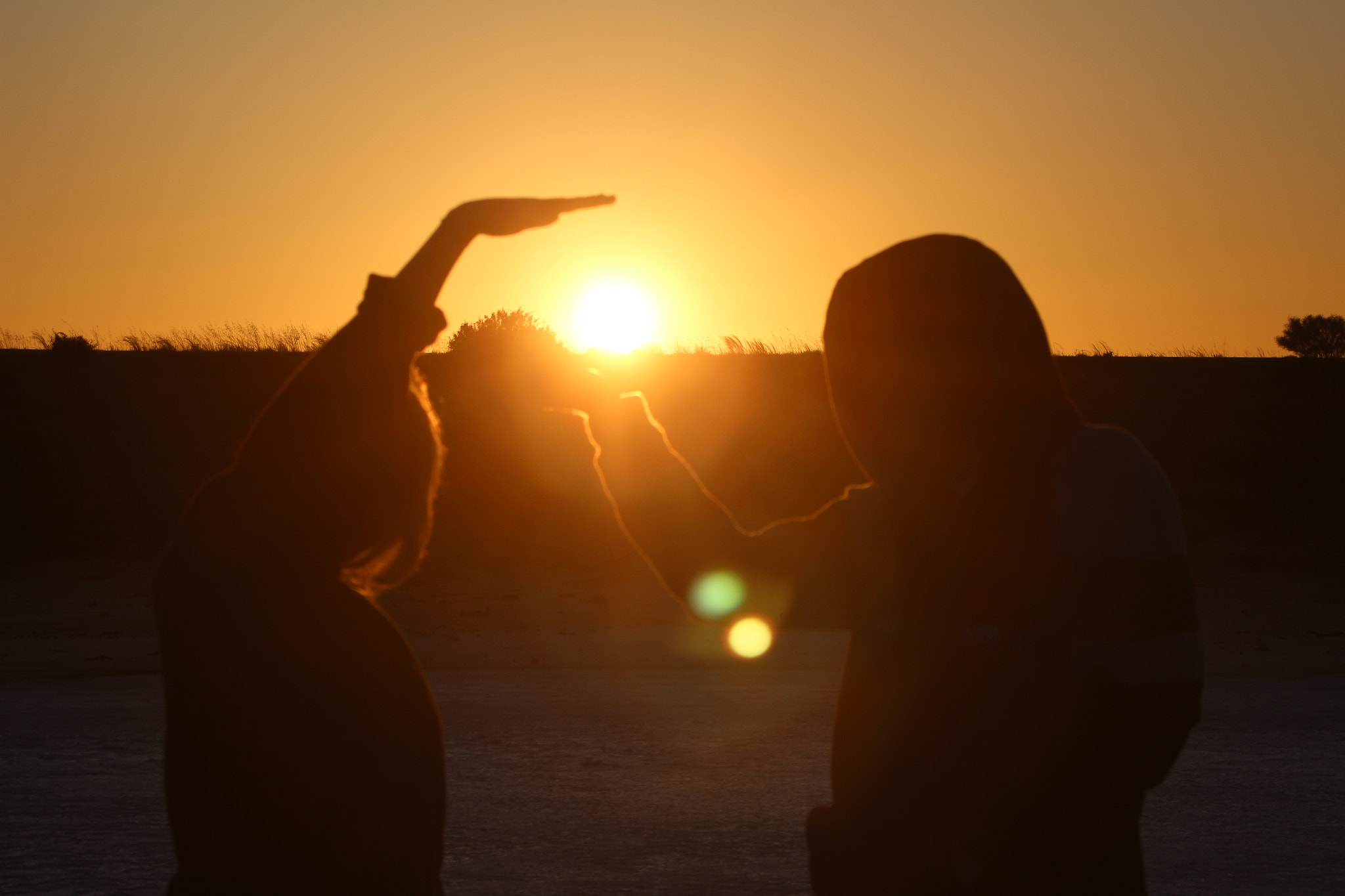 Canon EF 28-80mm f/3.5-5.6 sample photo. Framing the orange sun photography