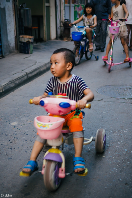 Olympus OM-D E-M10 + Panasonic Leica DG Summilux 25mm F1.4 II ASPH sample photo. Street in xi'an photography