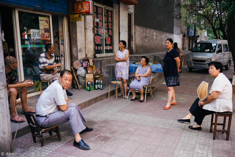 Olympus OM-D E-M10 + Panasonic Lumix G 14mm F2.5 ASPH sample photo. Street in xi'an photography