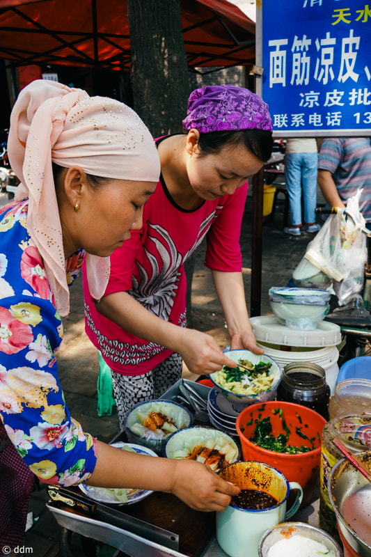 Olympus OM-D E-M10 + Panasonic Lumix G 14mm F2.5 ASPH sample photo. Food in xi'an photography