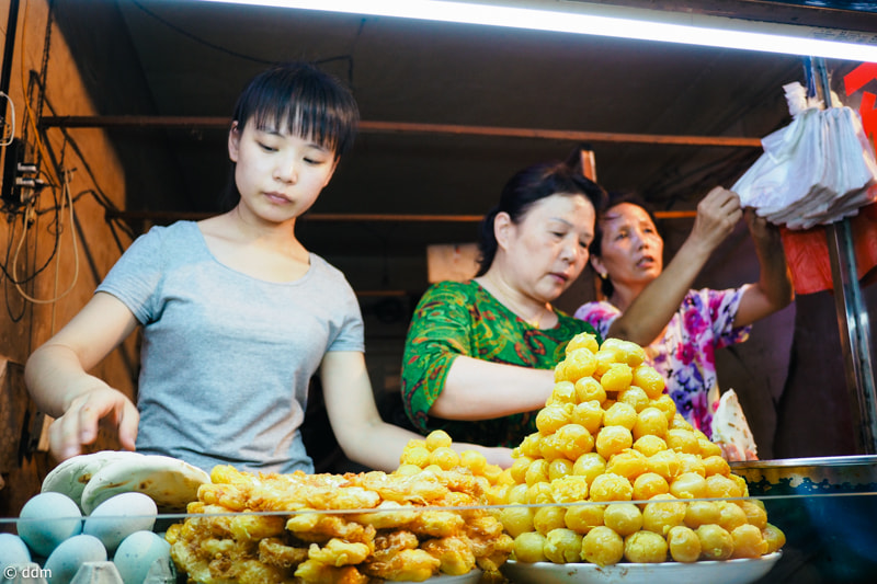 Olympus OM-D E-M10 + Panasonic Lumix G 14mm F2.5 ASPH sample photo. Food in xi'an photography