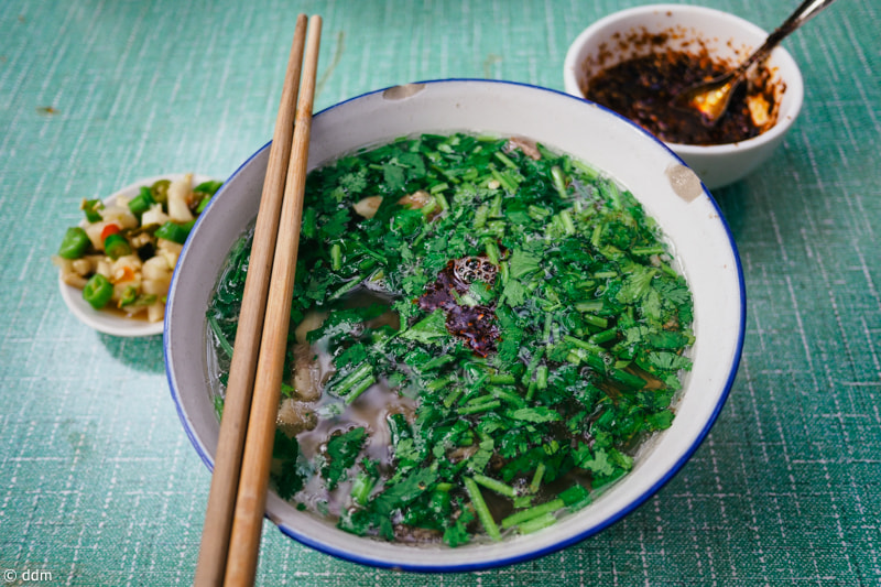 Olympus OM-D E-M10 + Panasonic Lumix G 14mm F2.5 ASPH sample photo. Food in xi'an photography