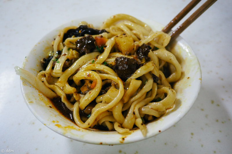 Olympus OM-D E-M10 + Panasonic Lumix G 14mm F2.5 ASPH sample photo. Food in xi'an photography