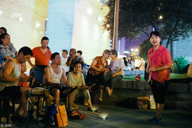 Olympus OM-D E-M10 + Panasonic Leica DG Summilux 25mm F1.4 II ASPH sample photo. Streets in xi'an photography