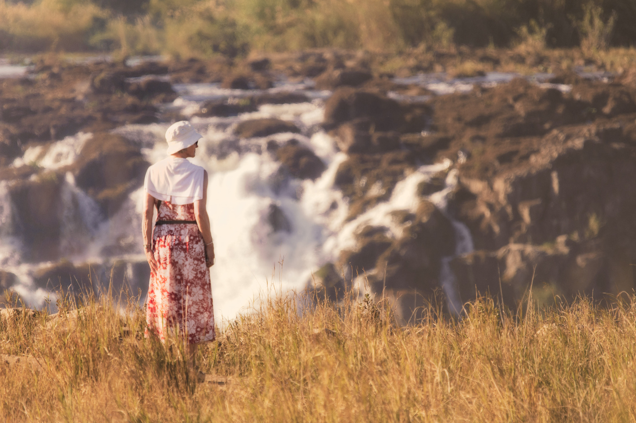 Sigma 120-400mm F4.5-5.6 DG OS HSM sample photo. Woman at victoria falls photography