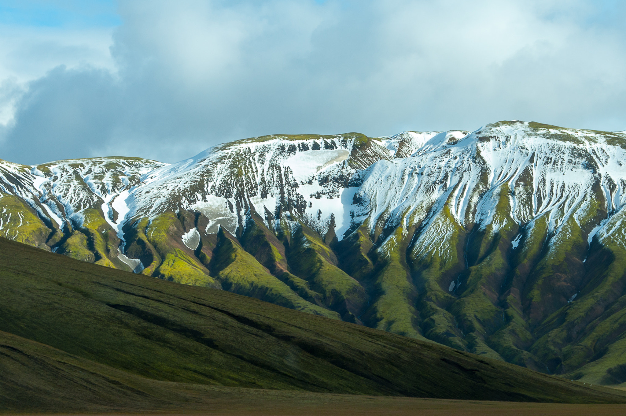 Sigma 18-250mm F3.5-6.3 DC OS HSM sample photo. Green valleys with white topping photography