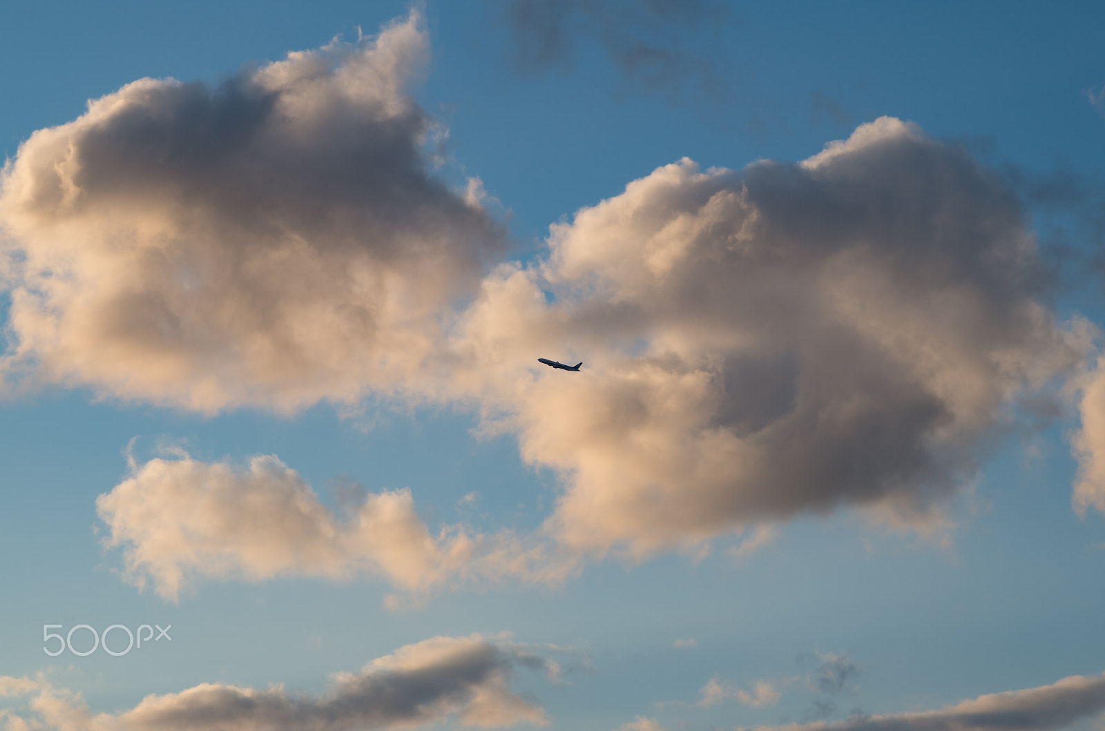 Pentax K-50 + Tamron AF 28-75mm F2.8 XR Di LD Aspherical (IF) sample photo. Airplane in clouds photography