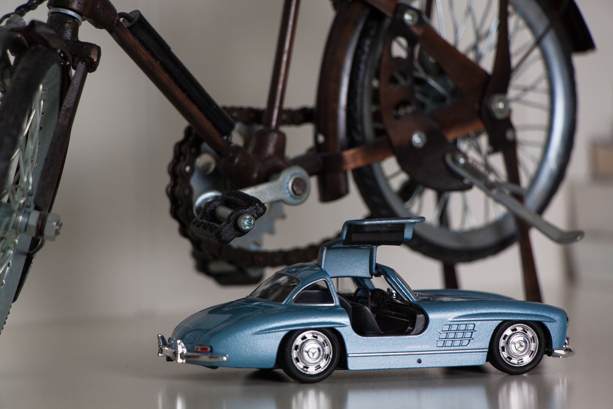 Canon EOS 50D + Canon EF-S 18-135mm F3.5-5.6 IS STM sample photo. Car vs. bike photography