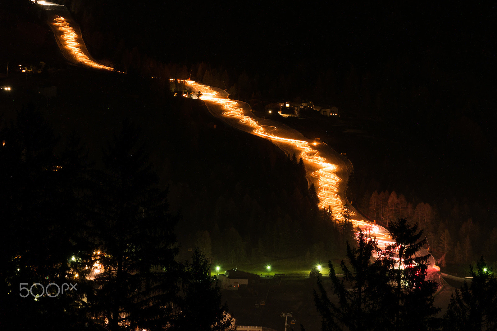Panasonic Lumix G X Vario 35-100mm F2.8 OIS sample photo. New year torchlight procession alta badia photography