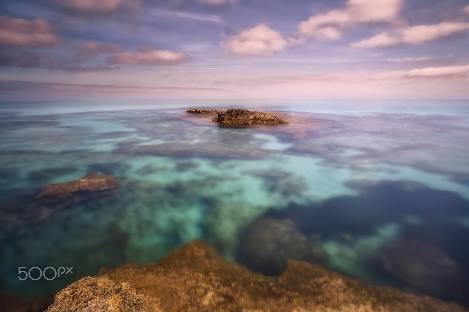 Sony a7R + ZEISS Touit 12mm F2.8 sample photo. Formentera agua luz y nubes photography